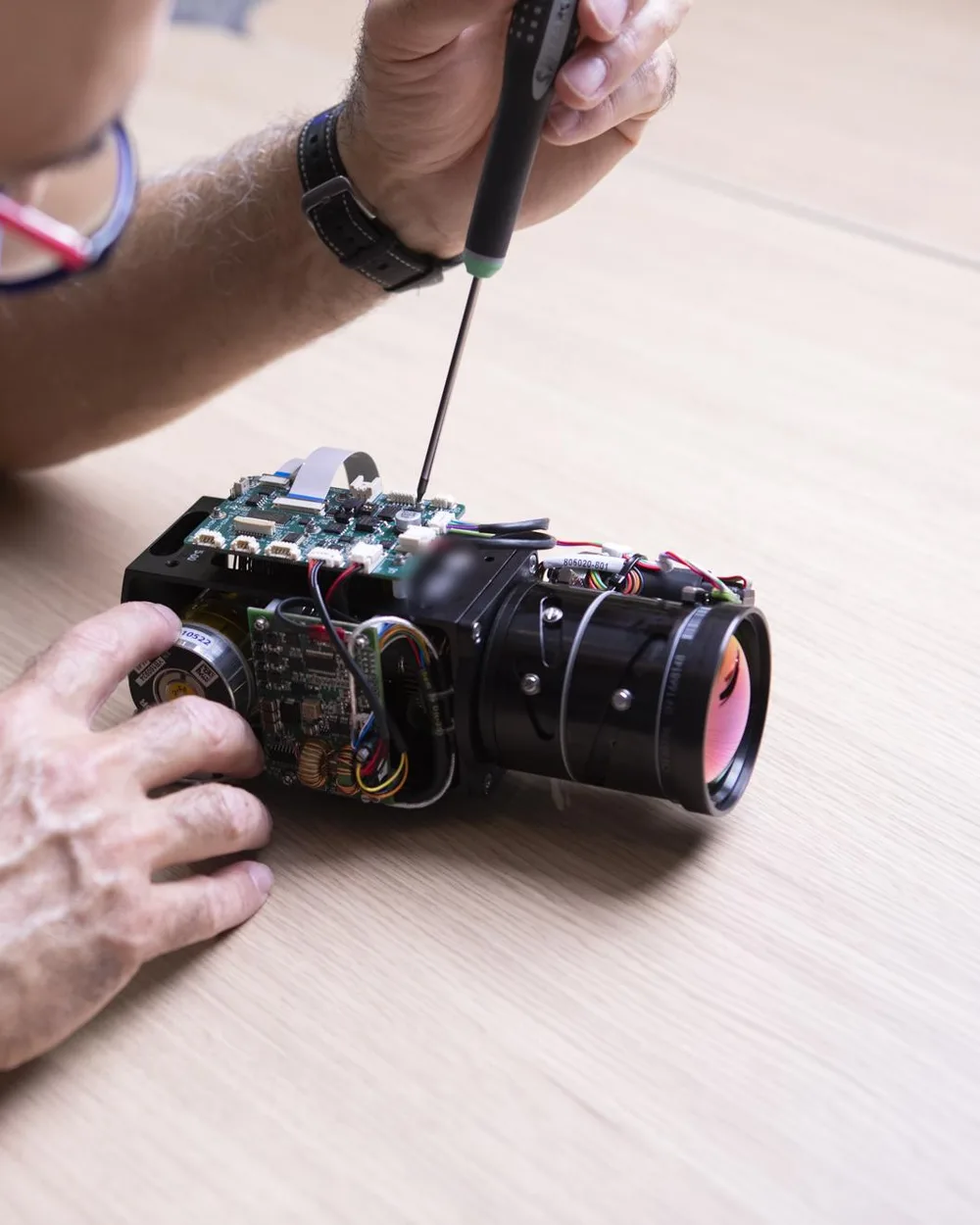 Engineer integrating a camera module for a DST gimbal